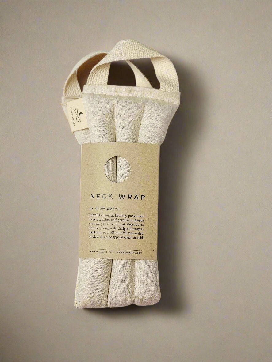Neck wrap in packaging with a label on a beige background. A natural linen and cotton weighted neck wrap to ease the stress away.
Melt away the tension: Let this cheerful therapy pack melt away the aches and pains as it drapes around your neck and shoulders.
Relax in your own way: This well-designed therapy pack neck pillow can be applied warm or cold depending on your preference.
Soothe tension & aches: Cold and warm therapy packs can work wonders for pain.
Your answer for natural relief: Designed wit