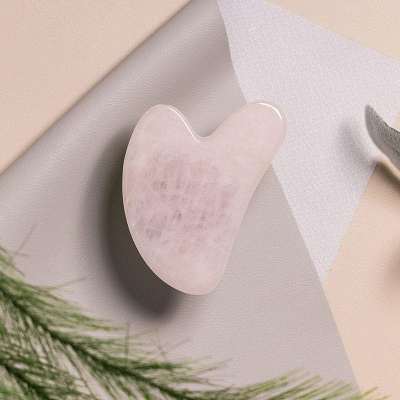 steel stone gua sha massage tool for face oil
