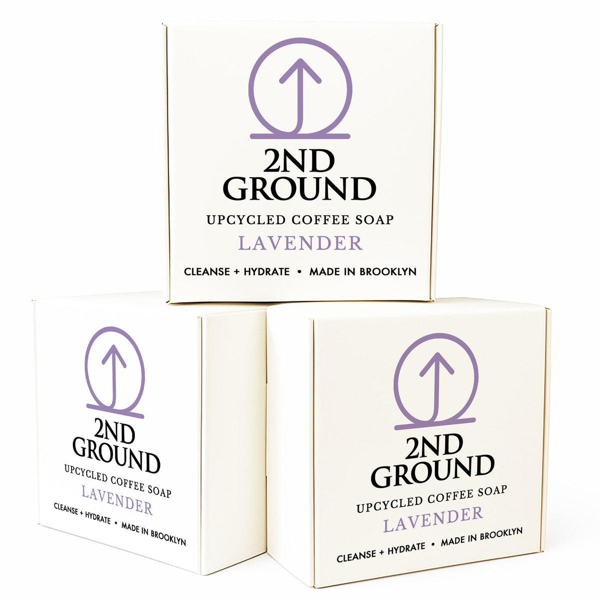 Three boxes of 2nd Ground upcycled coffee soap lavender on a white background. Collection of 2nd Ground upcycled coffee soap bars on a stone surface with branded boxes. comfrey salve for healing arthritis workout recovery drawing salve