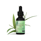 Bottle of comfrey oil with a dropper on a white background