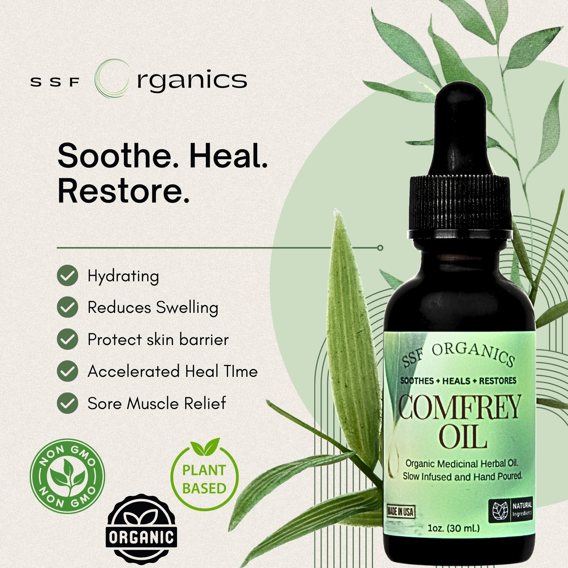 SSF Organics Comfrey Oil bottle with dropper on a light background with green leaves.