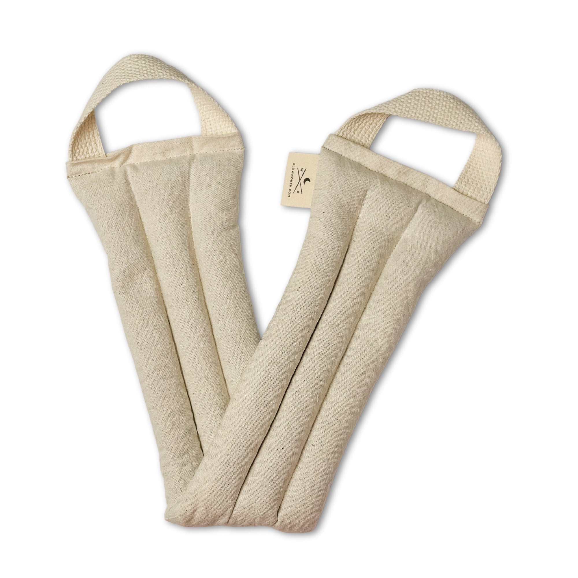 Two beige fabric straps with handles on a white background. A natural linen and cotton weighted neck wrap to ease the stress away.

Melt away the tension: Let this cheerful therapy pack melt away the aches and pains as it drapes around your neck and shoulders.
Relax in your own way: This well-designed therapy pack neck pillow can be applied warm or cold depending on your preference.
Soothe tension &amp; aches: Cold and warm therapy packs can work wonders for pain.
Your answer for natural relief: Designed