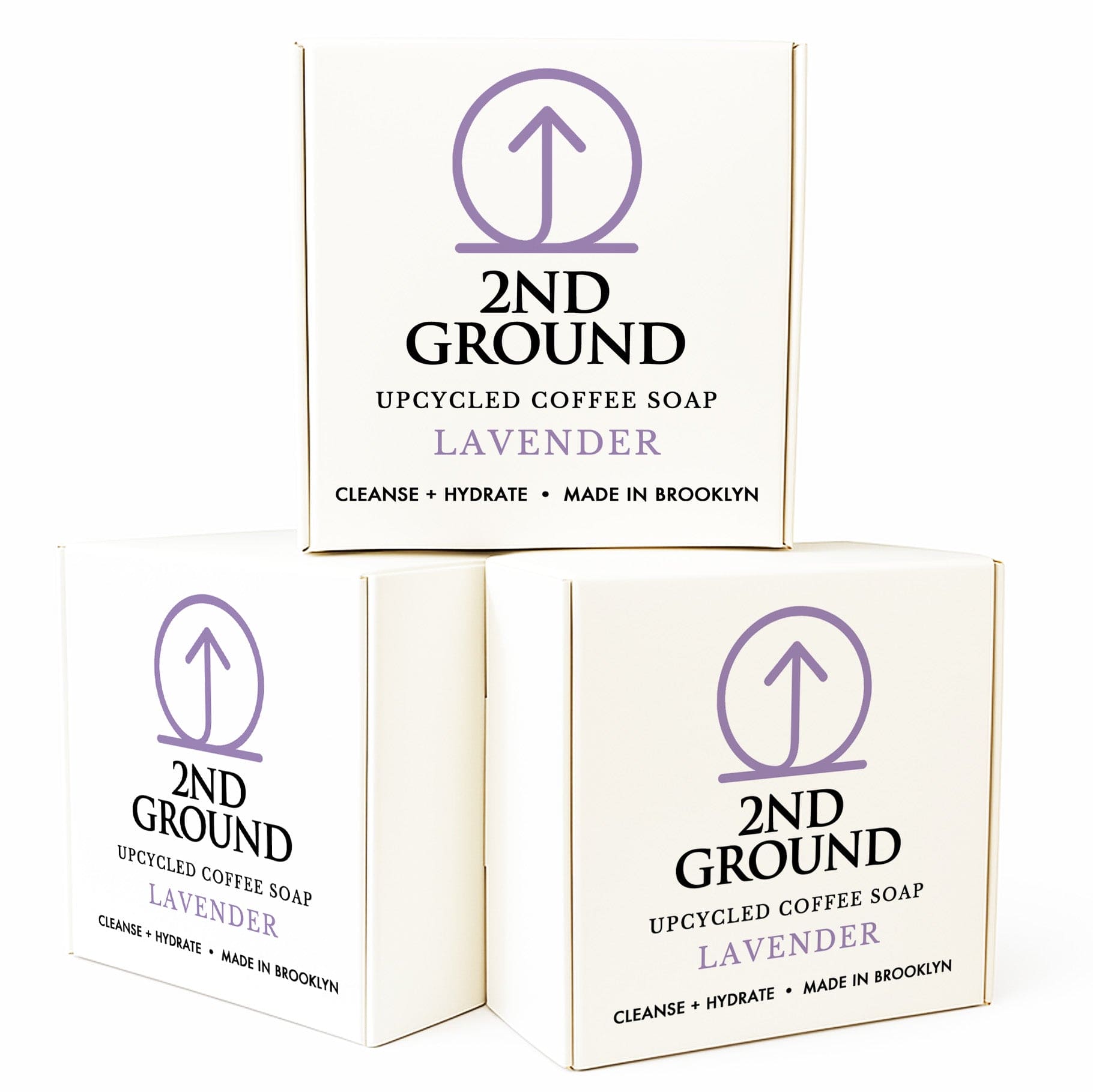 Three boxes of 2nd Ground upcycled coffee soap lavender on a white background. Collection of 2nd Ground upcycled coffee soap bars on a stone surface with branded boxes. comfrey salve for healing arthritis workout recovery drawing salve